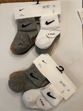 Nike 2 assorted 6 pack pair of socks. 6M-12M